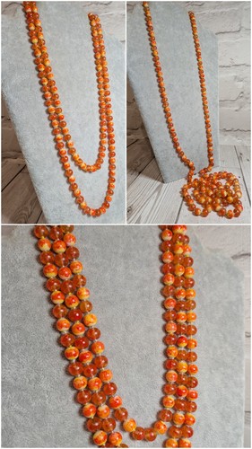 Long orange glass bead
